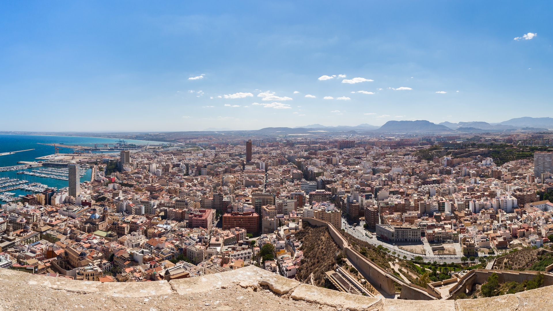 Panoramic view of Alicante city, port and Playa del Postiguet from Santa Bárbara castle
